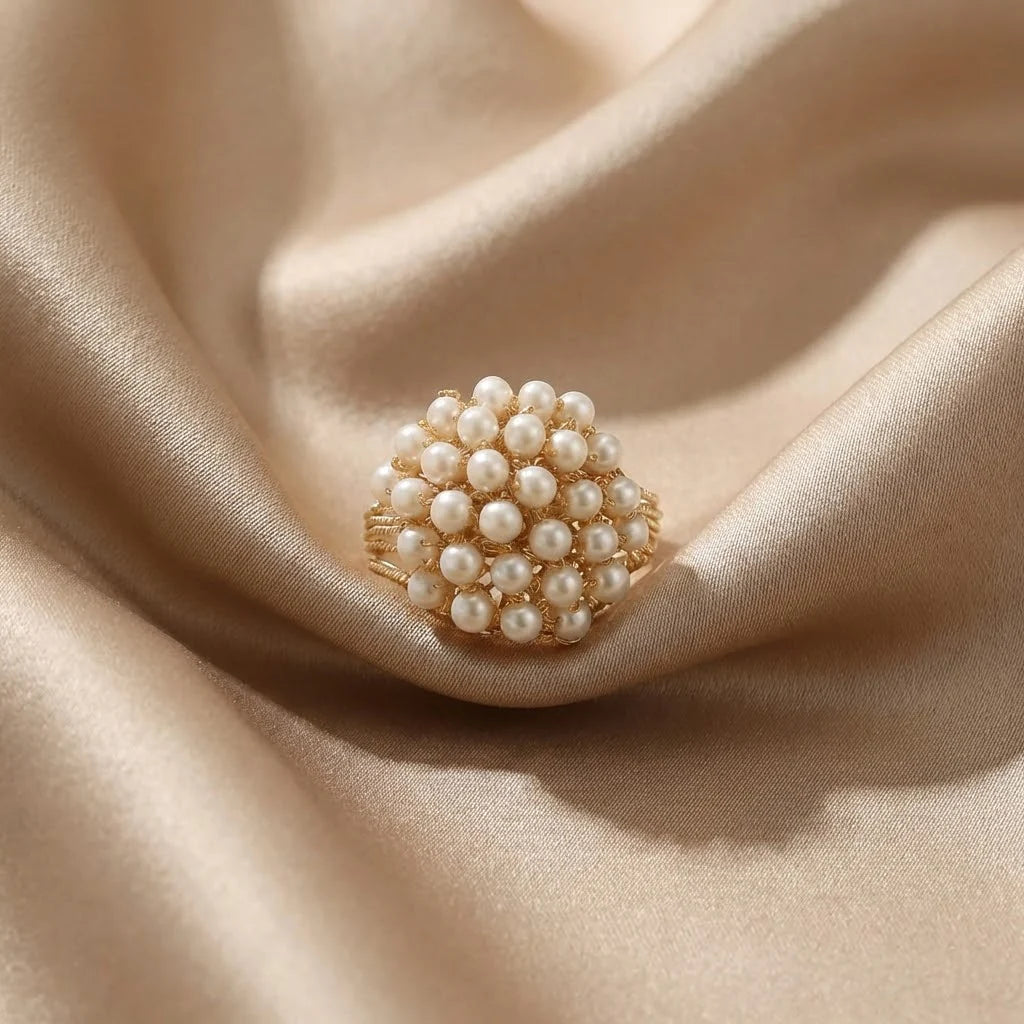 Ring with Embedded Pearls